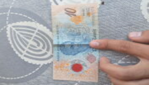 Moeda de 50 centavos com letra a